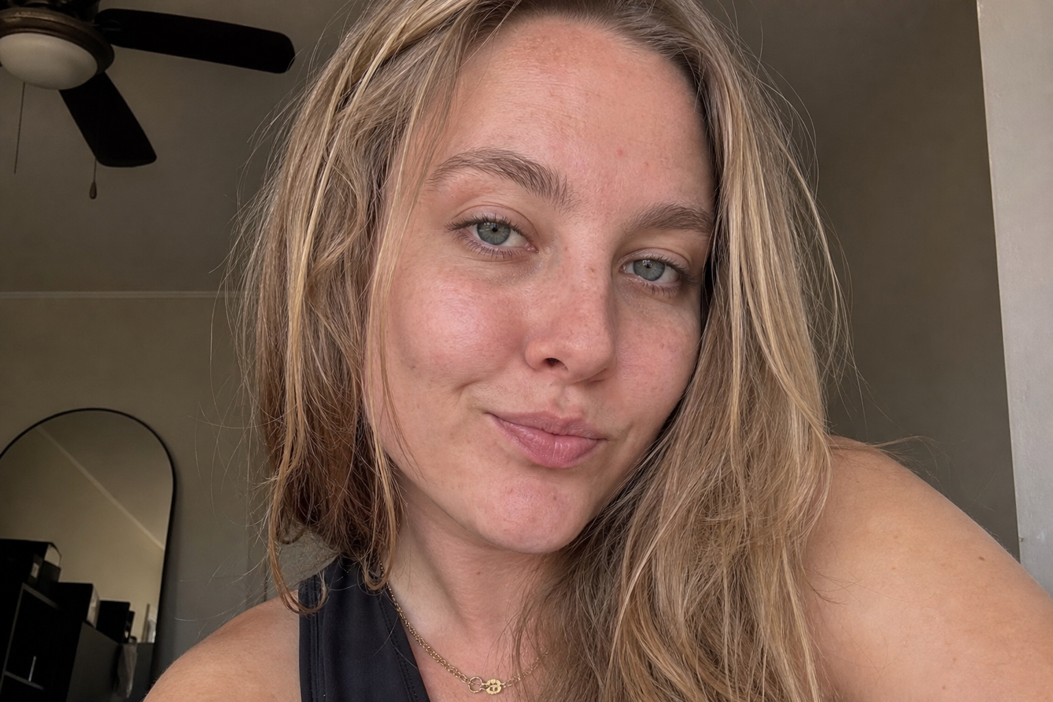 social media creator before retouching, uneven skin tone