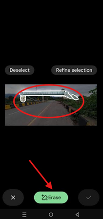 Selecting and removing background elements in pictures using Google Photos