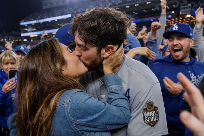 romantic couple kiss in stadium crowd