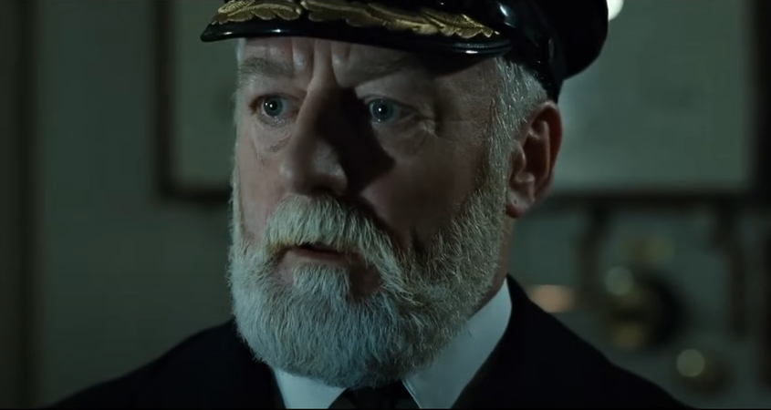 Captain Smith goes down with the Titanic